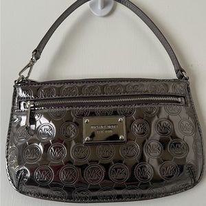 Michael Kors hand bag, fancy pattern in silver